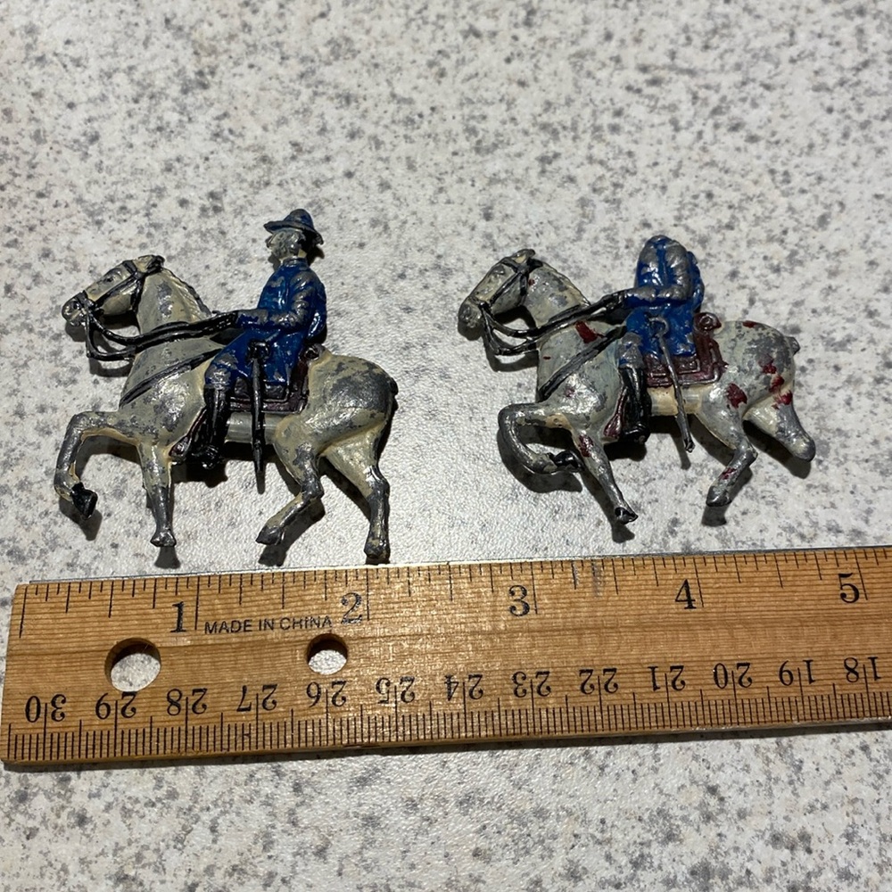 Flat vintage lead toy soldier on horseback